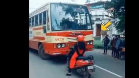 kerala-woman-stops-scooty-in-front-of-bus