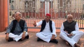 akhilesh-yadav-sits-on-protest-over-unnao-case-targets-up-government