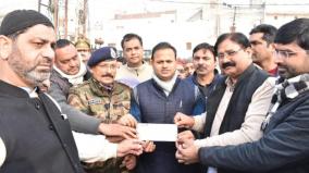 muslims-give-rs-6-lakh-cheque-as-damage-compensation-during-protests-to-up-govt