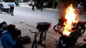 man-sets-motorcycle-on-fire-after-being-challaned-for-riding-without-helmet-arrested