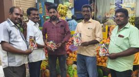 madurai-bjp-gives-books-to-orient-people-about-caa