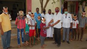 corona-awareness-masks-distributed-wearing-tiger-mask-on-tiger-day