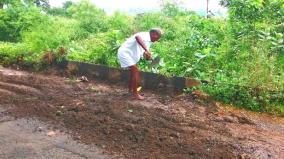 senior-citizen-repairs-road