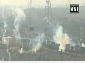 tear-gas-shells-fired-at-farmers-trying-to-break-barriers-with-tractors-at-delhi-s-mukarba-chowk