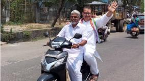 former-minister-collects-votes-while-driving-a-scooty-puducherry-people-enthusiastic