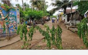 villagers-guarding-with-neem-leaves-to-prevent-outsiders