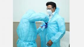 chief-minister-wearing-ppe-uniform-and-inquiring-about-the-health-of-corona-patients