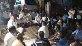 puducherry-law-sitting-on-the-ground-and-listening