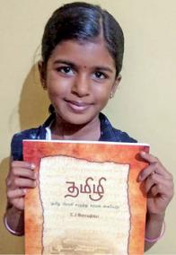 school-student-writing-brahmi-letters