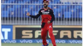 ipl-2021-maxwell-chahal-shine-as-rcb-qualifies-for-playoffs-after-beating-pbks