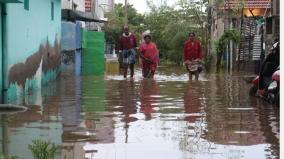 rainwater-infiltration-into-flats-in-tirupur-people-road-blockade-victims-deposit-in-school