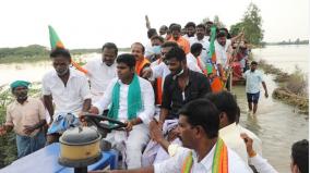 tn-bjp-chief-inspects-cuddalore-flood-disaster-by-driving-a-tractor-by-himself