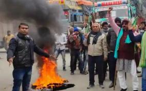 protesting-students-burn-tyres-block-roads-over-railway-jobs-exam-results