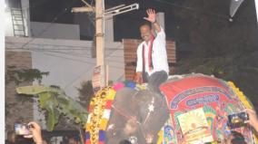 urban-local-body-polls-dmk-candidate-climb-on-the-elephant-and-campaign