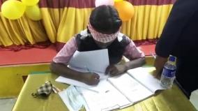 9th-std-student-writing-3-hours-in-blindfolded-for-international-women-s-day