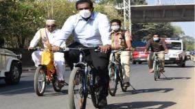 madurai-collector-travels-to-office-by-bycycle-sets-new-trend-for-govt-staff