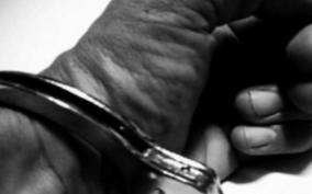 arrested-teacher-suspended