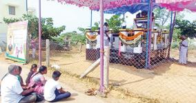 wife-dharna-in-front-of-the-memorial-of-the-deceased-soldier