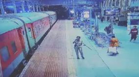 rpf-police-saves-falling-women-try-to-catch-the-running-train-on-egmore-railway-station