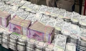 rs-1-27-crore-seized-from-brothers-who-came-on-bikes