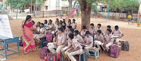 government-school-students-studying-under-a-tree