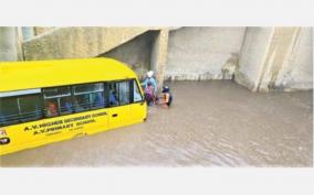 school-van-stuck-on-rain-water-filled-railway-under-bridge-on-kovilpatti-children-s-rescued