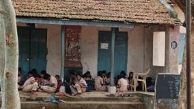 students-sit-and-study-on-the-veranda-of-a-dilapidated-building-classroom