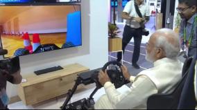 pm-modi-drives-car-in-sweden-virtually-from-delhi-in-india-mobile-congress-expo