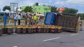 cylinder-van-overturns-due-to-wheel-burst