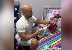 father-ironing-clothes-of-daughter-s-dolls