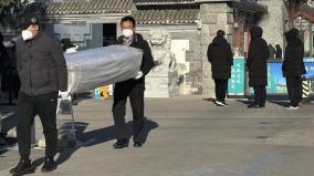china-reports-almost-60-000-covid-related-deaths-in-a-month