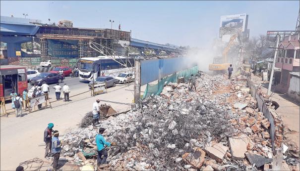 Demolition of 30 shops on GST Road for flyover in Birkankaranai is in full swing