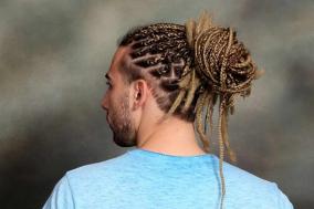 japan-school-stirs-debate-over-hairstyle-rules-after-boy-with-cornrows-separated-from-class