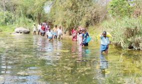 2-km-walk-across-the-river-to-buy-ration-items