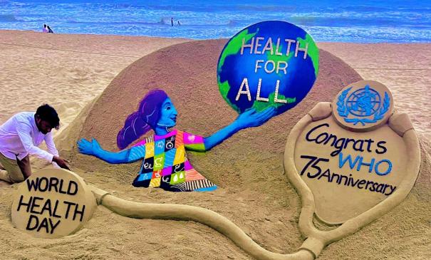 world health day good friday sand sculpture Sudarshan Patnaik make sand art work