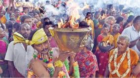 thandu-mariamman-temple-festival-a-procession-of-devotees-carrying-firepot