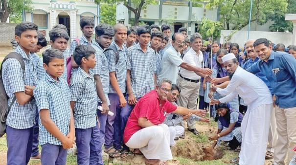 labourer planting saplings at his own expense