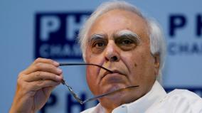 ncp-issue-kattappa-baahubali-poster-and-kapil-sibal-s-loaves