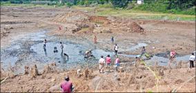 100-m-near-hosur-drainage-of-15-acres-of-lake-water-for-road-work