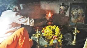 lamp-burning-on-coconut-water-at-nooronthu-samimalai-shivan-temple-near-denkanikottai