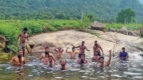 gushing-water-at-palani-thotti-madai-waterfalls-tourists-are-excited