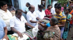 minister-subramanian-distributes-essential-to-flood-affected-people-in-saidapet