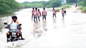students-crossing-the-river-dangerously