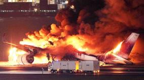 airliner-on-fire-on-runway-at-tokyos-haneda-airport