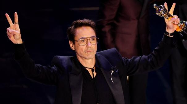 Robert Downey Jr wins best supporting actor Oscar for Oppenheimer