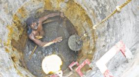 waste-removed-by-worker-to-repair-sewer-blockage