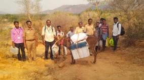 electronic-voting-machines-carried-on-donkeys-to-hill-village-near-hosur