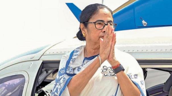 Mamata Slips on Helicopter Seat @ Election Campaign Trip
