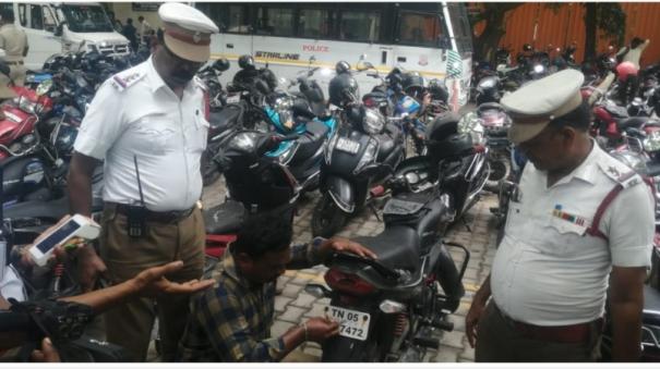 Police sticker on Two Wheeler number plates: Traffic police fined