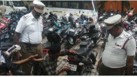 police-sticker-on-two-wheeler-number-plates-traffic-police-fined